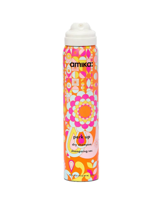 Amika dry shampoo can with colorful design on a white background